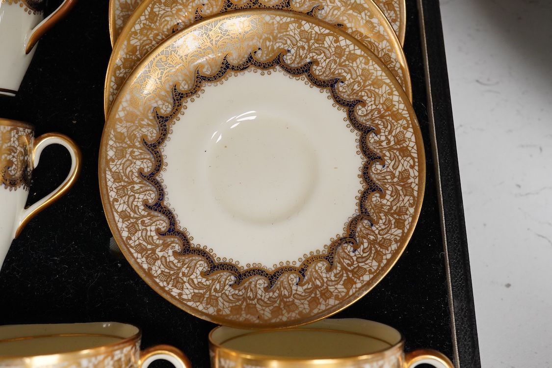 A cased Royal Doulton coffee set